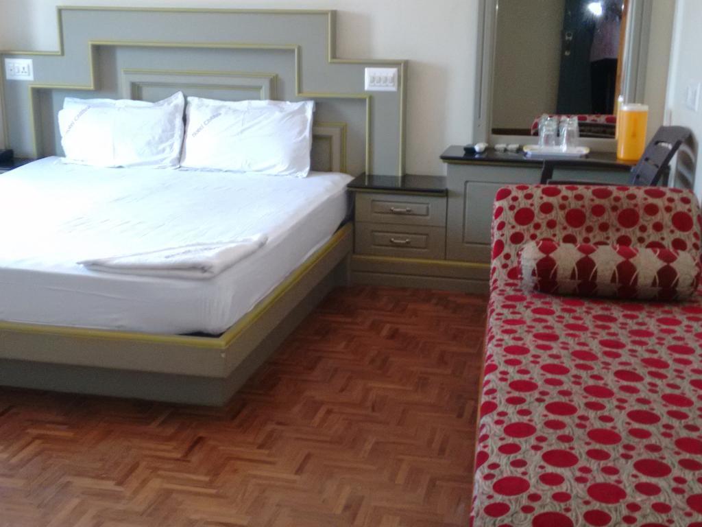 Hotel Chithra Kânyâkumârî Chambre photo